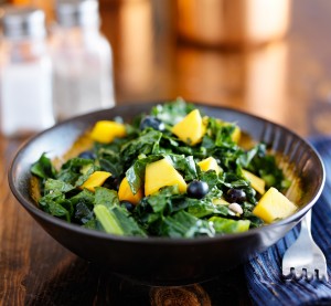 bowl of healthy mango and kale salad